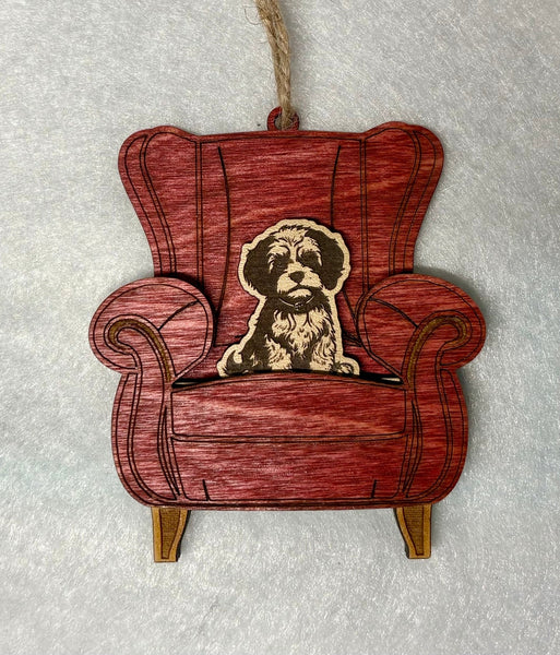 Red chair pet ornament shown with one removable dog insert