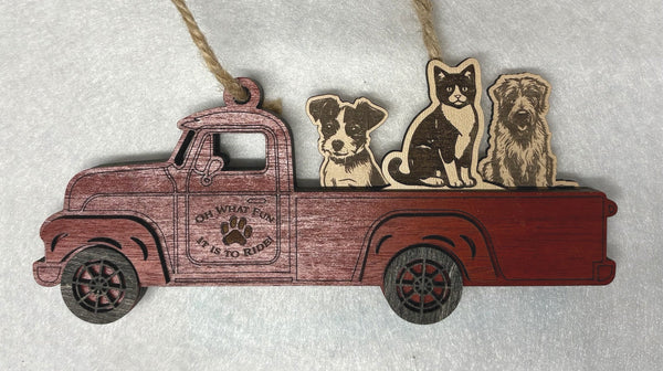 Red truck pet ornament shown with three removable pet inserts